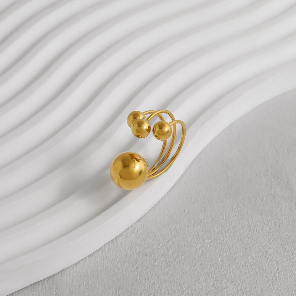 Three Small Gold Ball Rings - Image 4