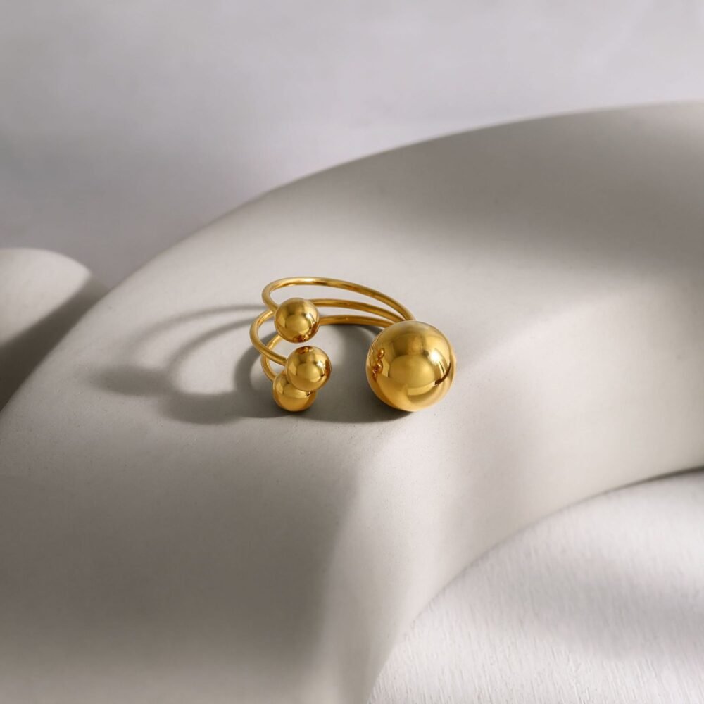 Three Small Gold Ball Rings