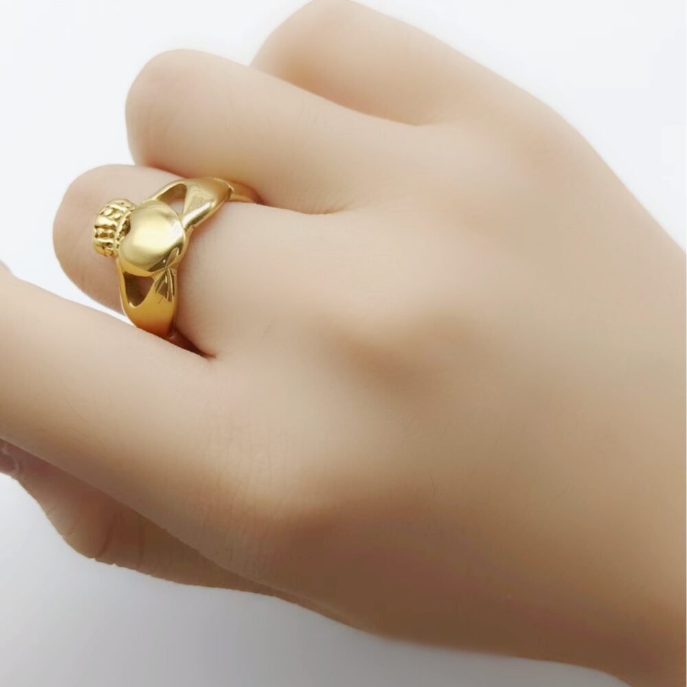 Men's ring holding a crown heart-shaped ring