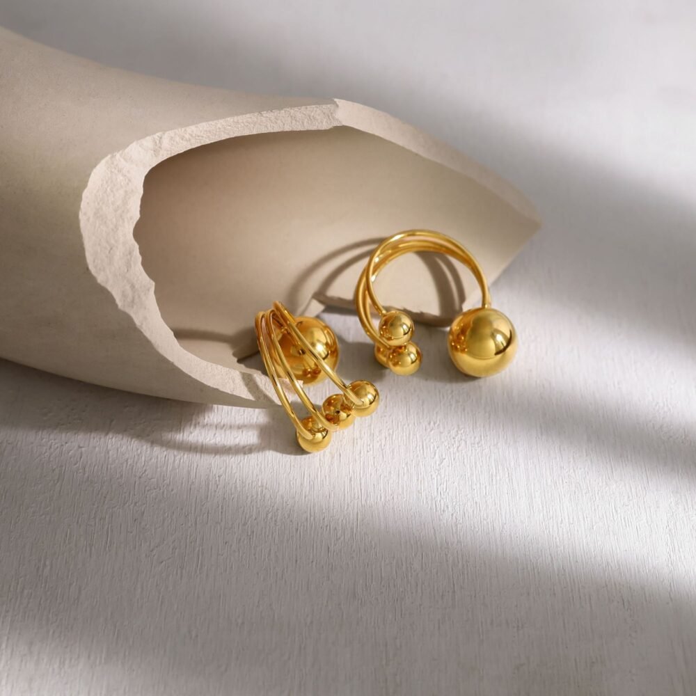 Three Small Gold Ball Rings - Image 2