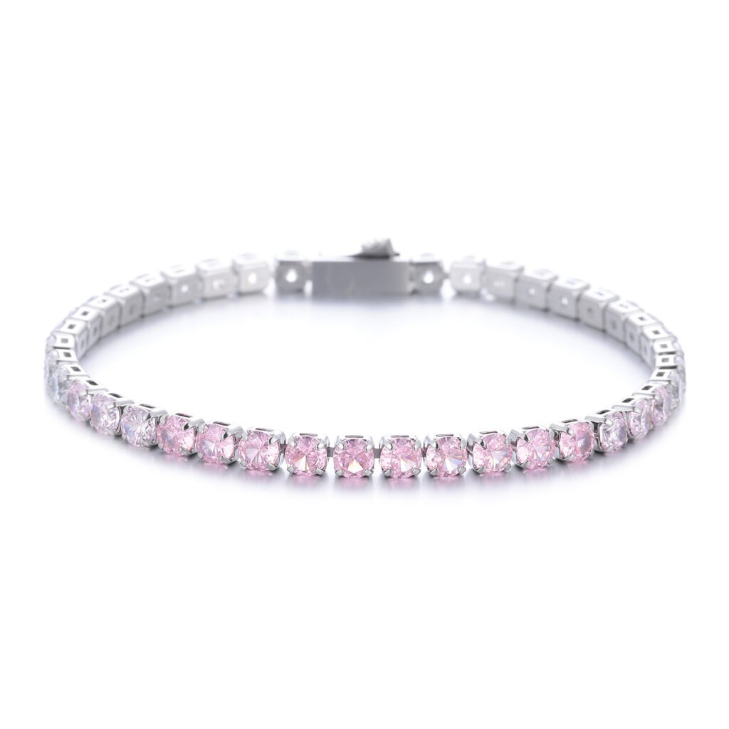 Gradient zircon tennis bracelet with pink and clear stones in silver setting.
